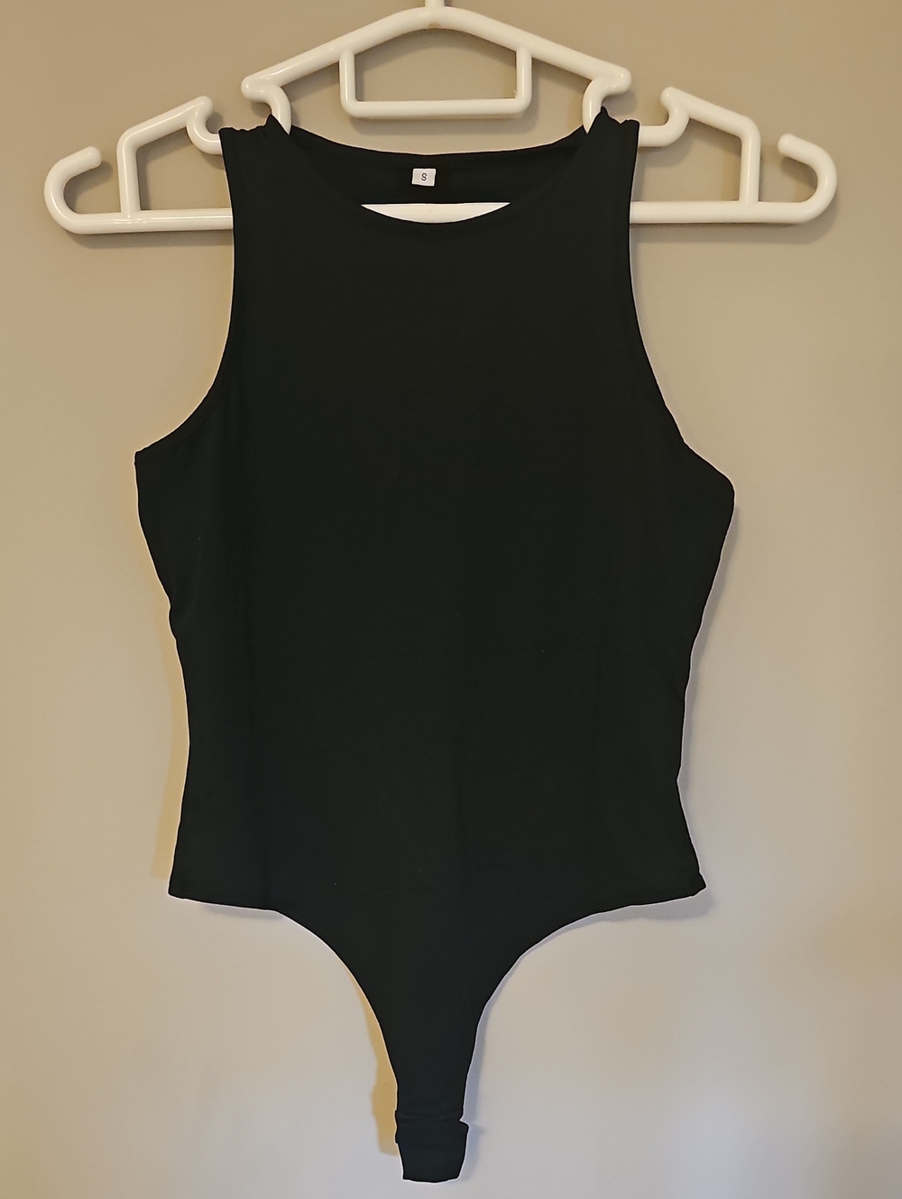 NWOT Womans Black Sleeveless One-Piece Bodysuit SMALL